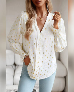 BLUSA MANGA LARGA ESTAMPADO DORADO