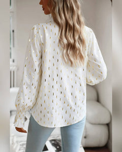 BLUSA MANGA LARGA ESTAMPADO DORADO