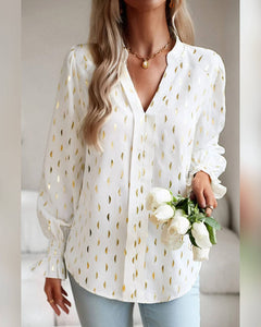 BLUSA MANGA LARGA ESTAMPADO DORADO