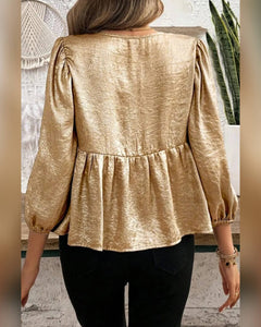 BLUSA BRILLO MANGA 3/4 ATADA