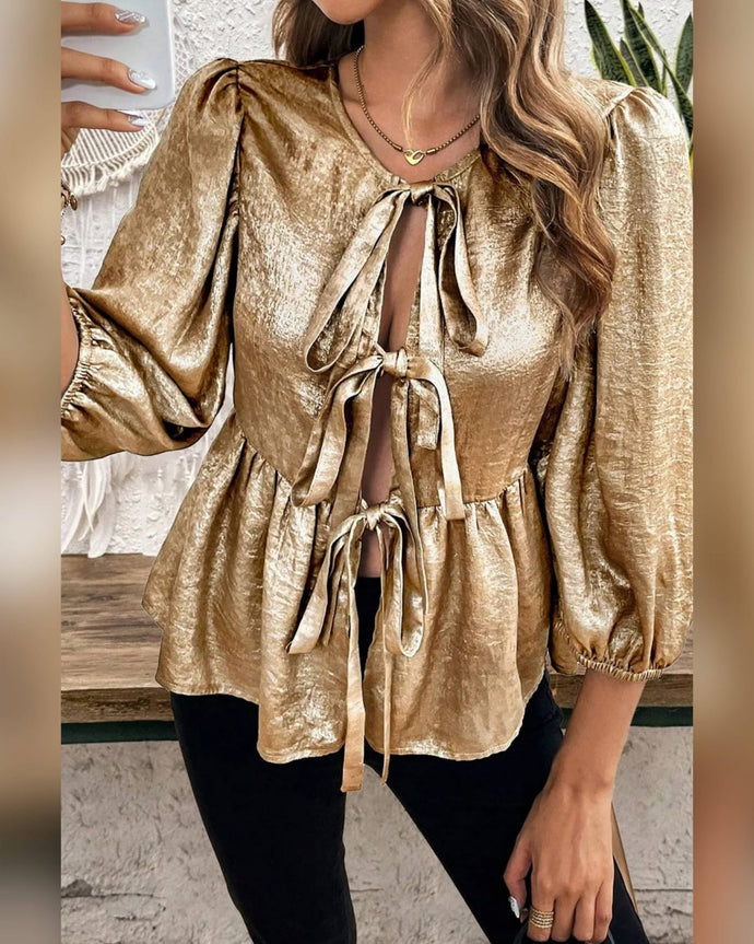 BLUSA BRILLO MANGA 3/4 ATADA