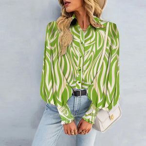 BLUSA ESTAMPADA CON PUÑOS