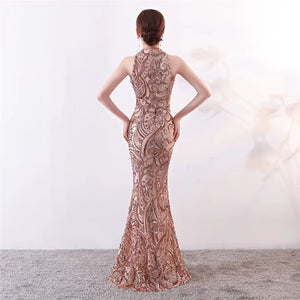 VESTIDO LARGO BORDADO CUELLO HALTER C/GOTA